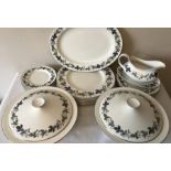 A Royal Doulton Burgundy pattern dinner service.