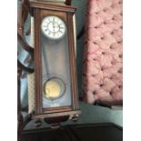 A 19thC mahogany Vienna wall clock. 98 h x 31cms w.