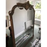 A 19thC ornate gilt framed overmantle mirror. 180 h x 160cms w.Condition ReportSome slight loss to