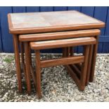 Teak tiled top nest of 3 tables. Largest 55 x 45cms x 42cms h.