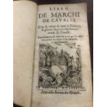 A small leather bound book, 12 x 7cms lacking front cover. Libro De Marchi de Cavalli depicting