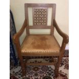 A Robert Mouseman Thompson carver chair and 3 side chairs.