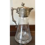 A silver topped claret jug, London 1997. Maker W.W Bacchus head pourer and floral decoration, finial