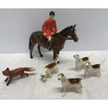 Beswick Huntsman on horse, 4 beagles and a fox. Huntsman stands 21cms h. Condition ReportBroken tail