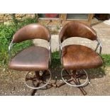 Two swivel kitchen chairs.