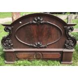 Victorian mahogany bed end with carved decoration, some varnish wear. 160 w x 110cms h.