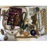 A large quantity of vintage costume jewellery to include malachite bead necklace, Guess ladies