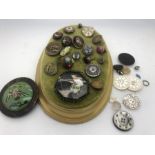 Vintage buttons etc, some mounted on velvet pad including enamel glass painted dogs head etc.