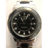 Contemporary ladies Tag Heuer Formula 1 wristwatch in steel and black ceramic case and bracelet,