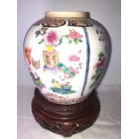 A Chinese famille rose porcelain vase, lacking lid with 6 character Yung Cheng mark. 25cms