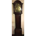 A brass faced oak cased longcase clock. Francis Moore, Ferrybridge, plaque to inside August 21 1755.