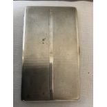 An engine turned silver cigarette case Birmingham 1941. 178.7gms.