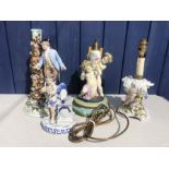 Four continental porcelain figures to include 3 lamp bases all with damage/repair. 33cms h tallest.
