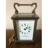 Brass carriage clock by JW Benson. 11cms h.