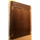 Oak two door 19thC corner cupboard with brass hinges. 115h x 84cms w.