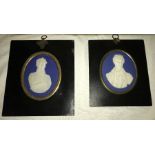Two oval Wedgwood jasperware plaques in wooden mounts. Plaque 10 x 8cms.