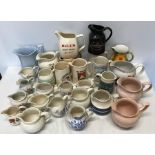 Collection of 28 pottery jugs including 6 pub jugs, Bells, Glengoyne, Fremlins, Martell's, Old