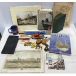 A mixed lot to include tin plate wind up Island ferry and Harbour tug, merchant shipping brass