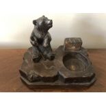 A vintage carved black forest bear match holder. 13 x 8cms.