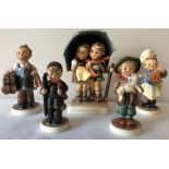 A collection of five Hummel figures including The first sheep etc.