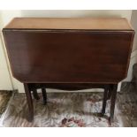 An Edwardian mahogany inlaid Sutherland table. 60 x 76cms extended.