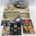 Commodore Amiga a500 with pad, leads and assorted games, Alien Breed, Captain Planet, Simpsons,