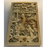 A late 19thC ivory card case of rectangular form with lift off lid, elaborately carved. 10.5 x 6.