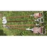 Four shooting sticks, metal, 3 with leather seats.