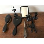 An ebony part dressing table set with silver handled button hook.