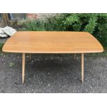 Ercol dining table on square tapered legs.