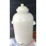 Cream glazed lidded jar. 75cms h.