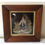 A 19thC woolwork embroidery in contemporary frame. 31 x 31cms.