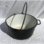 Black and white enamelled metal jam pan, 31cms w x 17cms h.