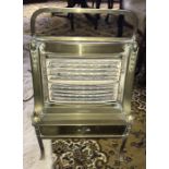 A vintage brass Belling & Co electric fire.