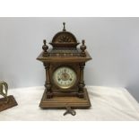 Walnut cased mantle clock, enamel face with brass decoration, HAC Wurttemberg 14 day strike, with