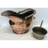 Copper coal helmet with embossed bird and floral decoration, rope twist handle together with a small