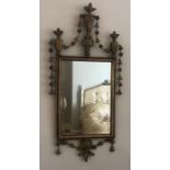 A bevel edged metal framed wall mirror. 99 h x 47 w x 112cms h.