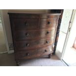 A Victorian chest 4 height chest of drawers, 2 short over 3 long drawers on bun feet. 133 h x 109