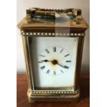 A good quality brass cased carriage clock with gorge movement. 14 h x 10cms w. Condition