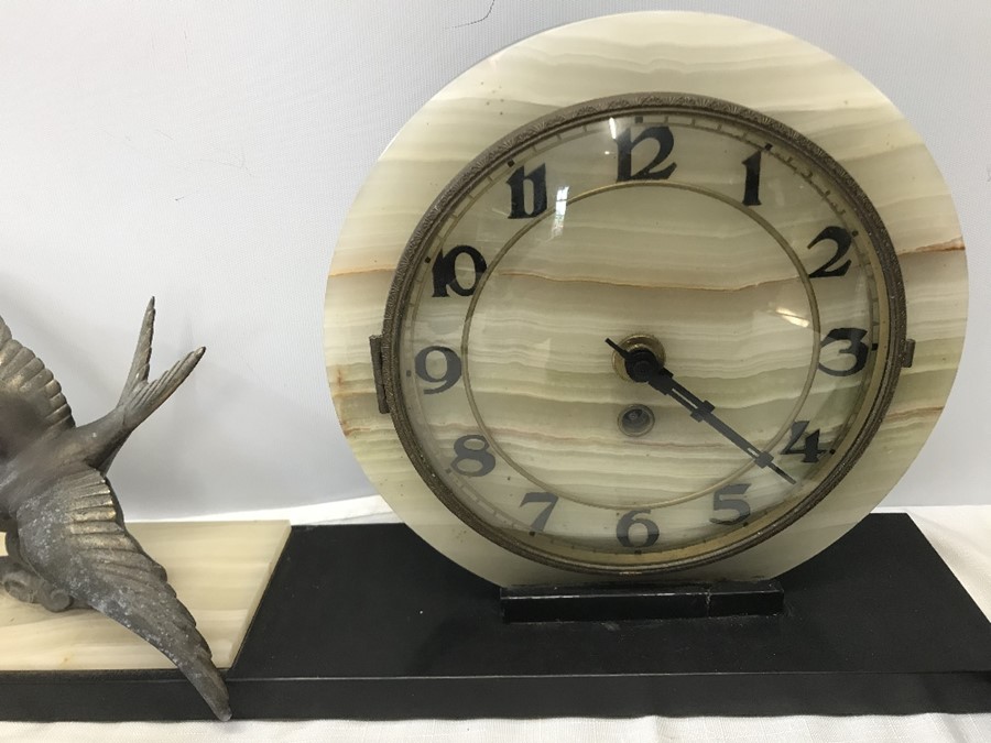 A French Art Deco two colour marble and onyx clock garniture with circular dial mounted to one - Image 2 of 4