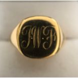 An 18 carat signet ring. 14.6gms, size S.