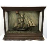 A 19thC diorama half model sailing boat Thomas and Ann in a glazed display case, measuring 55 h x 70