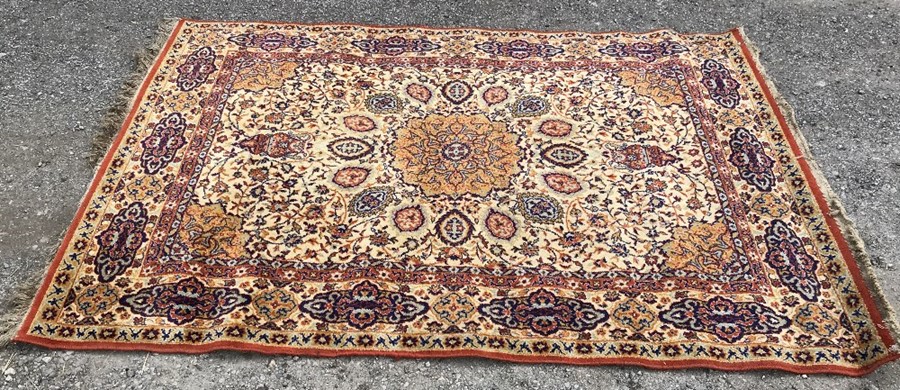 A vintage wool rug. 204 x 148cms.