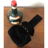 A musical, empty cherry Bestle bottle with a velvet vintage evening bag, good condition.