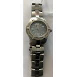 A ladies Tag Heuer Professional 200 Meters wristwatch, circular blue dial date aperture, stainless