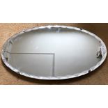 Oval bevel edged wall mirror. 68 w x 40cms h.
