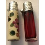 A cranberry glass and silver topped scent bottle with stopper, 7.5cms h Birmingham 1904 together