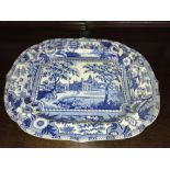 Large blue and white transfer printed platter with well and tree. 53 x 42cms.