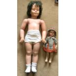 A 1960'70s large Rosebud plastic doll, approx 85 cms h and a straw filled cotton body doll,