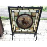Brass framed leaded stained glass fire screen with painted panel of deer. 71 h x 49 w. Condition